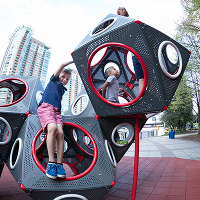 Steel playcube structures for playgrounds.